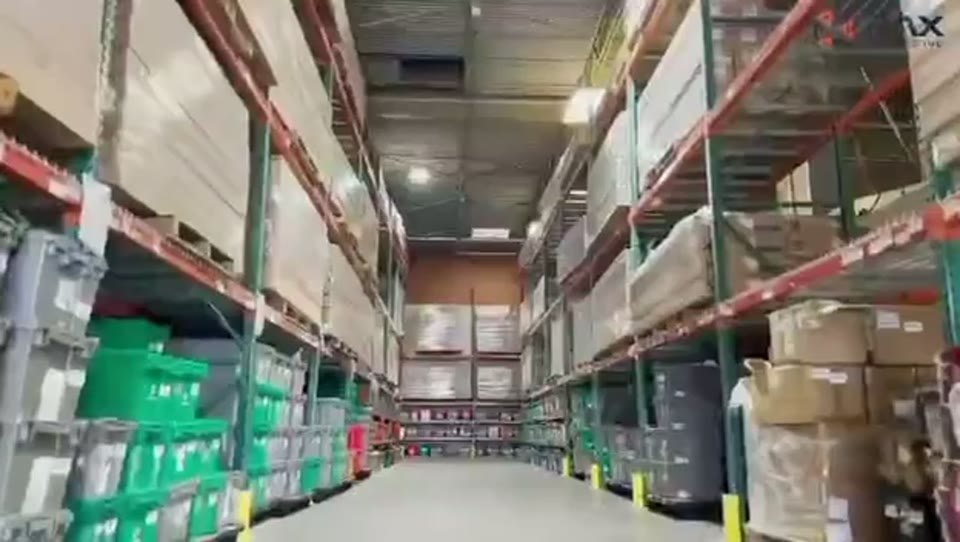 Walkthrough of a ShipHub (PAX Trading Inc) fulfillment center showing pallet racking and organized inventory